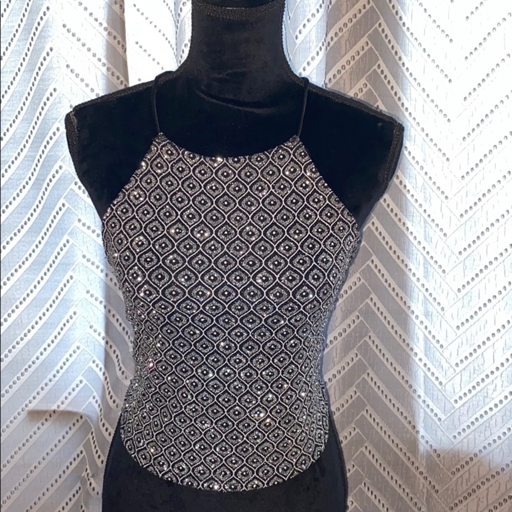 Silver and black top. Great for a festival look.
